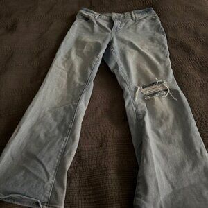 Hollister, curvy boot cut, distressed, light color blue jeans, Size 12S